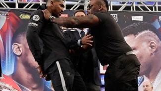 Next Story Image: Heavyweights Joshua, Miller hurl insults instead of leather
